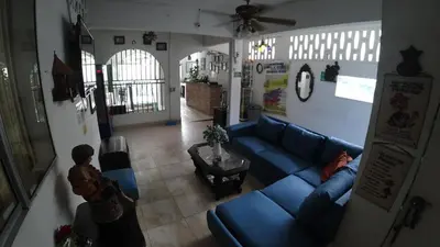 an overhead view of a living room with a blue couch at Hostal La Española de Getsemani in Cartagena de Indias