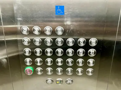 a row of silver buttons on a metal wall at Julius Sky Apartment 1-Swimming pool and close to the beach in Cartagena de Indias