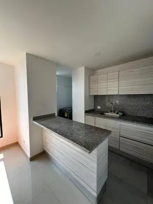 a kitchen with a counter top and a sink at ApartaEstudio in Barranquilla