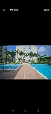 a picture of a tennis court in front of a building at Apartamento Cartagena Serena del Mar - Capriella in Manzanillo del Mar