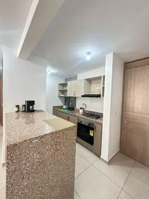 a kitchen with a counter top in a room at MY lOVE BARRANQUILLA 1 in Barranquilla