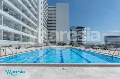 an image of a swimming pool in a building at Sunset Oceanfront Studio in Cartagena de Indias