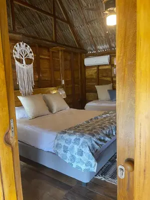 a bedroom with a bed with a basketball hoop on it at Casa Origen Boutique en San Bernardo del Viento in San Bernardo del Viento