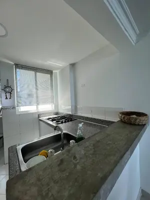 a kitchen with a sink and a counter top at Unwind in Santa Martas Oceanfront Retreat in Playa Dormida