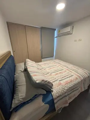 a small bedroom with a bed in a room at Moderno Apartamento en Barranquilla, Miramar in Barranquilla