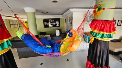 a room with a swing in a room at Hotel Barranquilla Inn in Barranquilla