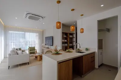 a kitchen and living room with a sink and a couch at Palmar del Mar in Cartagena de Indias