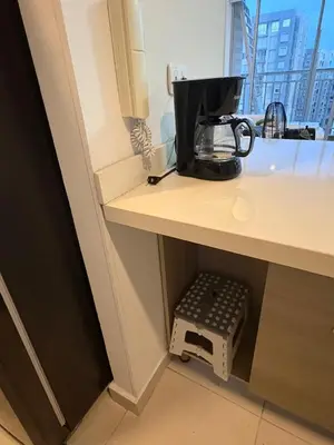 a coffee maker sitting on a counter in a room at Luxury apartment - Barranquilla 10 minutes to Buenavista in Barranquilla