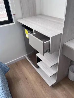 a small white desk in a small room at Loft Deluxe - Nuevo, Acogedor, Integral, Ubicación inmejorable in Barranquilla