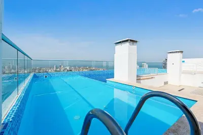 a swimming pool on the roof of a building at Apartamento Marbella Piso 28 - Playa in Cartagena de Indias