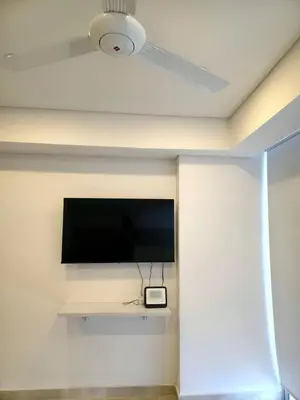 a flat screen tv on a wall in a room at Cartagena Beach Exclusive apto in Cartagena de Indias