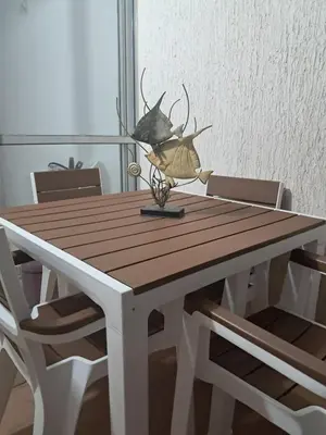 a wooden table with two antlers on top of it at Aqualina 911 in Cartagena de Indias