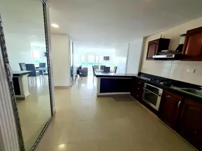 a room with a kitchen and a living room at Apartamento con la mejor vista Cartagena in Cartagena de Indias