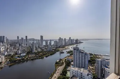 a view of a city with a river and buildings at Laurhomes Laguito Floor 33, 3HBT in Cartagena de Indias