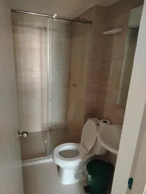 a bathroom with a shower and a toilet and a sink at Summer 811 in Cartagena de Indias