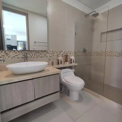 a bathroom with a toilet and a sink and a shower at Palmetto Sunset in Cartagena de Indias