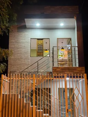 a house with a staircase in front of it at Cactus Beach Stay APARTAMENTO in Santa Marta
