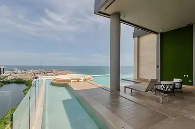 a balcony of a house with a swimming pool at Nuevo Vista al Mar / Centro Histórico Piso 28 in Cartagena de Indias