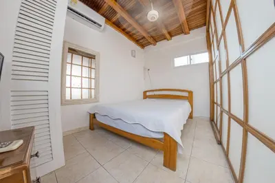 a bedroom with a bed and a window at Cozy apartment in the old city 421 in Cartagena de Indias