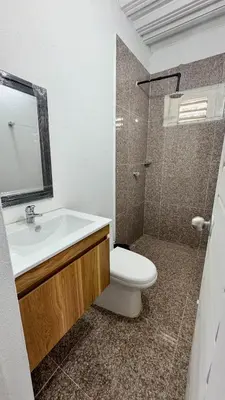 a bathroom with a toilet and a sink and a shower at Cabañas en Cartagena JhonliMar in Isla de Tierra Bomba