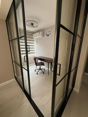 a room with a desk and a chair and a mirror at Open Floor Chic Interior Design Pool Full Kitchen in Barranquilla