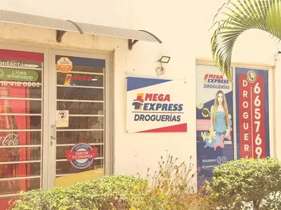 a store with signs on the side of a building at Luxury CTG Condo Near Beach Cold AC & Hot Water in Cartagena de Indias