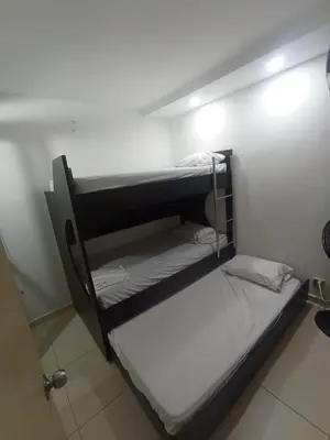 a couple of bunk beds in a room at aqualina911 in Cartagena de Indias