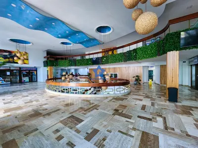 a hotel lobby with a reception desk and a large lobby with at Estudio Vista Mágica - Piso 17 in Cartagena de Indias