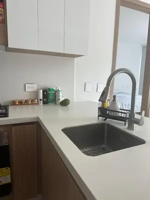 a kitchen counter with a sink and a window at baia kristal paraiso aguas cristalinas in Cartagena de Indias