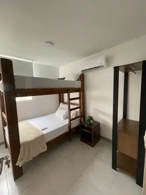 a room with two bunk beds in a room at Sunset 47 mar y vida in Cartagena de Indias