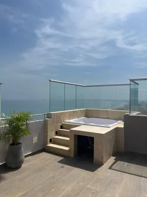 a building with a bath tub on a balcony at Sunset 47 mar y vida in Cartagena de Indias
