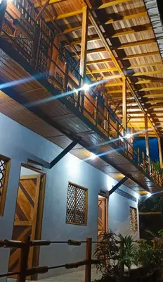 a room with a staircase in a building at Cabaña Alojamiento Valhalla in Rincón