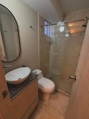 a bathroom with a toilet and a sink and a shower at Apartment in Alameda del Río in Barranquilla