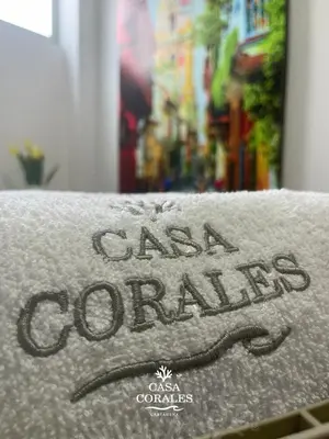a close up of the words crash condos on a mattress at Casa Corales Cartagena in Cartagena de Indias