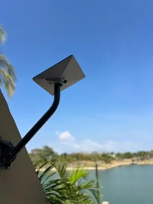 a street light with a view of a beach at Exclusive Loft in Barú, access by sea and land in Isla Barú