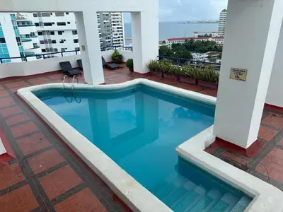 a swimming pool on the roof of a building at Apartamento Moderno con Piscina en el Laguito in Cartagena de Indias