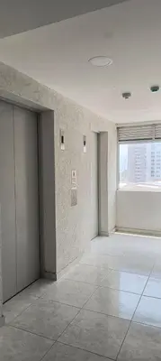 an empty room with a large window in a building at EntreLagos Family Suite Vista a la Ciudad in Cartagena de Indias