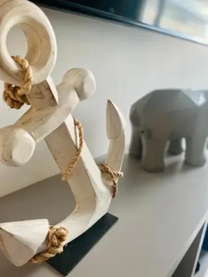a wooden statue of an elephant next to a statue of an elephant at Luxurious, modern apartment in Cartagena Morros 3 in Cartagena de Indias