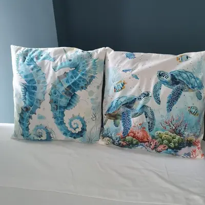 two pillows sitting on top of a bed at Luxurious, modern apartment in Cartagena Morros 3 in Cartagena de Indias