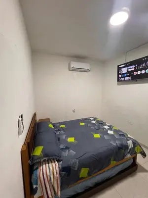 a bedroom with a bed in a room at Villa Manglar in Coveñas