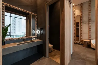 a bathroom with a sink and a toilet at OZ Hotel Collection in Cartagena de Indias