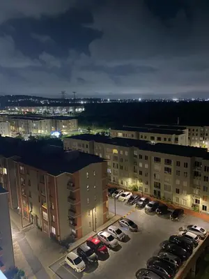 a parking lot with cars parked in a parking lot at Apartamento alameda del Rio in Barranquilla