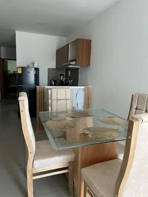 a glass table and chairs in a kitchen at Edificio K in Cartagena de Indias