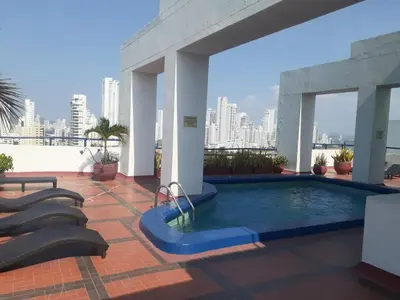 a swimming pool on the roof of a building at aprtamento CTG in Cartagena de Indias