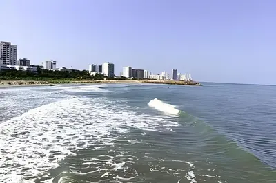 a view of a beach with a city in the background at Playa, Vista al mar y Comodidad, ubicación perfecta in Cartagena de Indias