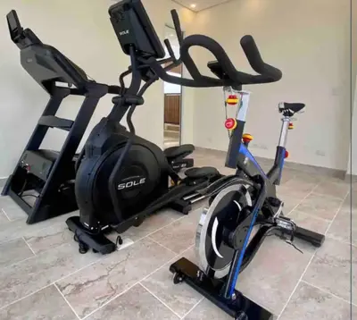 a gym with a treadmill and an exercise bike at Impresionante vista Dominique 2 suites in Cartagena de Indias