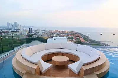 a white couch sitting on top of a building at Luxury 2B, stunning View 4 Blocks from walled City in Cartagena de Indias