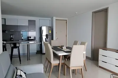 a kitchen and dining room with a table and chairs at Luxury 2B apartment, Amazing View in Cartagena de Indias