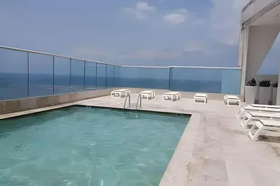 a swimming pool on the roof of a building at Espectacular vista en la mejor zona del Laguito in Cartagena de Indias