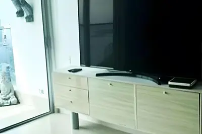 a large television on top of a dresser in a bathroom at Ocean Majesty, Luxury Haven close to Walled City in Cartagena de Indias